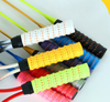 Laminated thickened non-slip dual-color keel grip tape with perforations for badminton and tennis racket sweat absorption